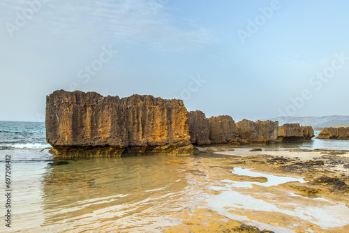 Mountains Embrace the Shore: Rimel's Scenic Beachscape in Bizerte, Tunisia