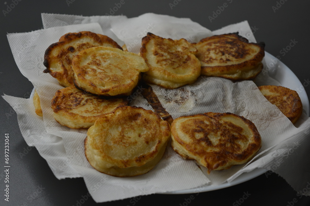 Morning breakfast, fresh, warm pancakes placed on white, soft paper, napkin. Morning breakfast, fresh, warm pancakes placed on white, soft paper, napkin.