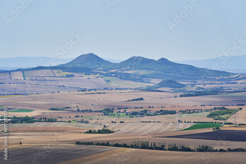 Central Bohemian Uplands or Central Bohemian Highlands is a geomorphological region in northern Bohemia of the Czech Republic. Beautiful and pitoresque countryside with many mountains and summits. photo