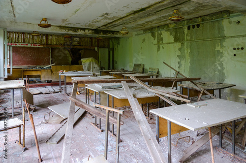 Devastation in premises of abandoned school in resettled village of Pogonnoye in exclusion zone of Chernobyl nuclear power plant, Belarus