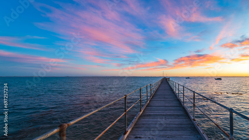 Robe pier with early bird fishermen during sunrise, Limestone Coast, South Australia