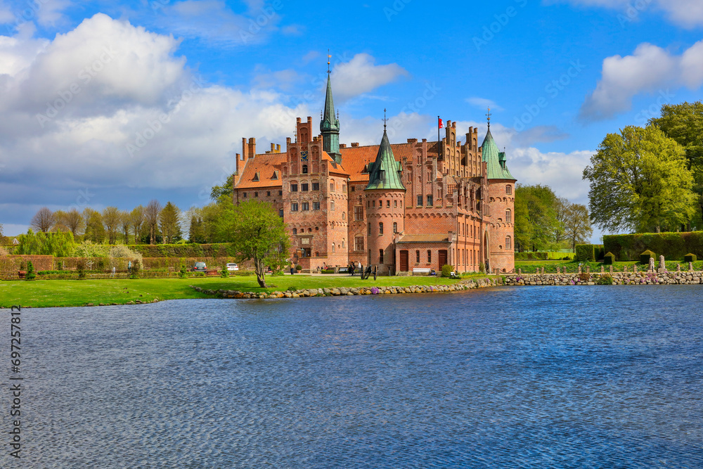 Fototapeta premium Denmark Egeskov Castle view on a cloudy spring day