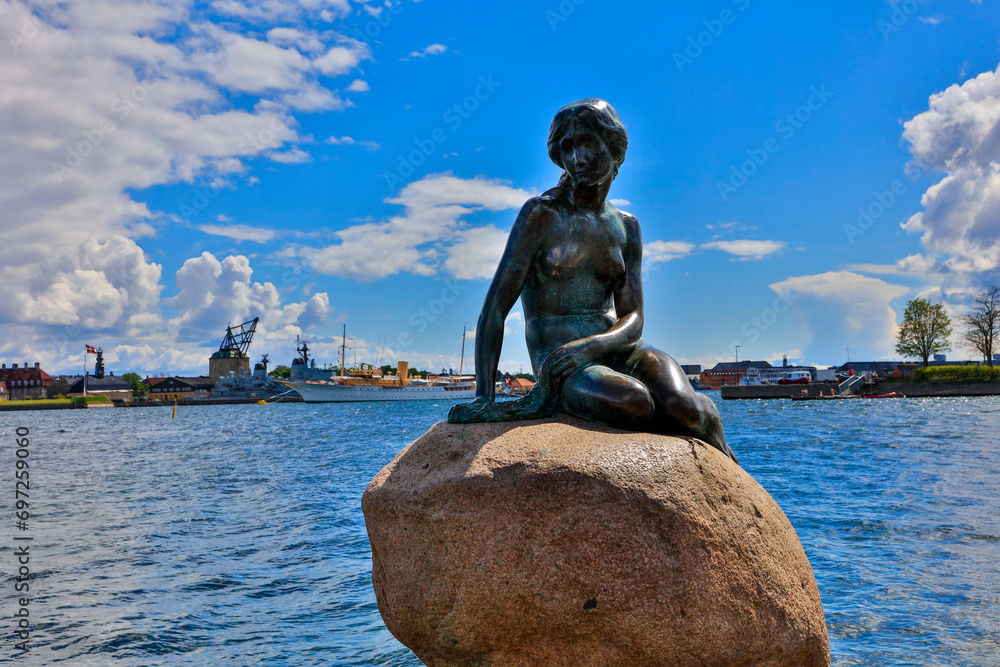 Denmark Copenhagen sculpture of the Little Mermaid on a sunny spring day - obrazy, fototapety, plakaty 