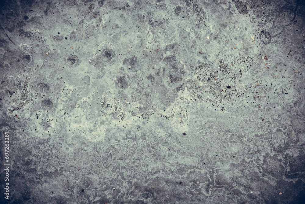 Texture of a dirty and shabby gray wall