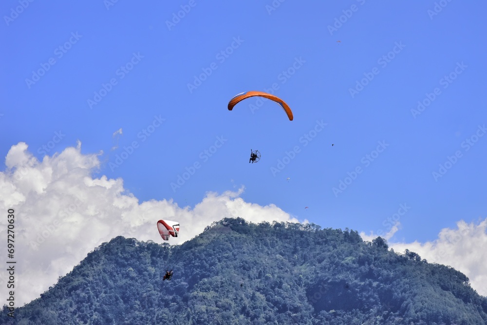Paragliding is one of the extreme sports of Indonesian society which takes off from the peak of Mount Paragliding is one of the extreme sports of Indonesian society which takes off from the peak of Mount