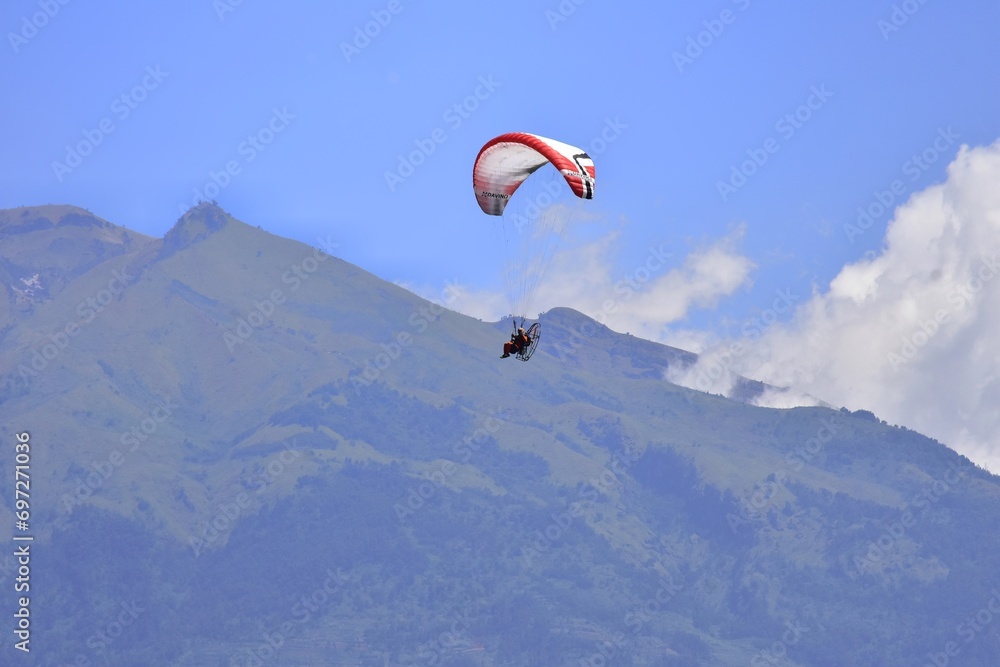 Paragliding is one of the extreme sports of Indonesian society which takes off from the peak of Mount Paragliding is one of the extreme sports of Indonesian society which takes off from the peak of Mount