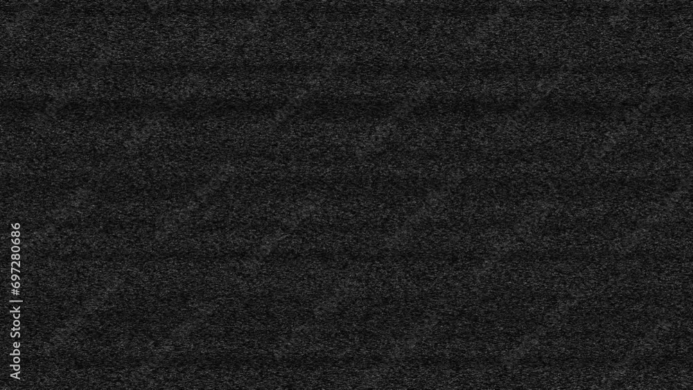 Footage of TV noise, displaying an analog signal with disruptive