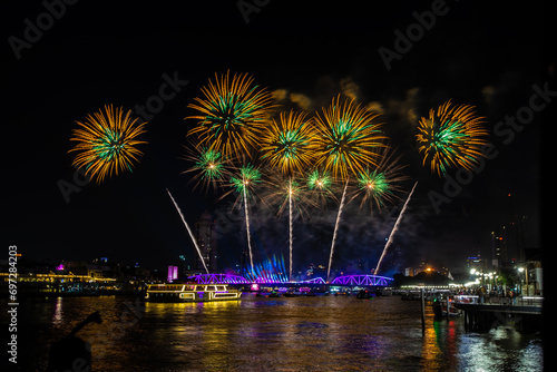 Celebrate the Chao Phraya River Festival with a light and sound show and fireworks display on the bridge in Bangkok, the capital of Thailand.