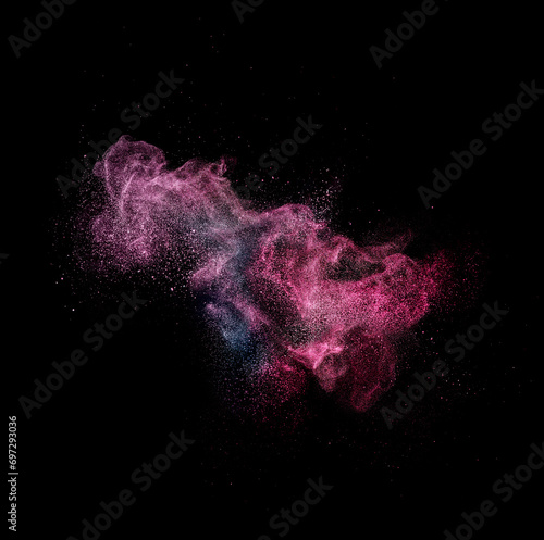 Pink violet colored cloud stardust glitter in air on black background for overlay blending mode. Stopping the movement of colorful particles of galaxy, selective focus