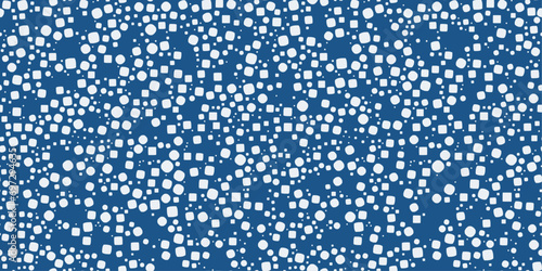 Blue background and white shapes scattered randomly in a pattern.