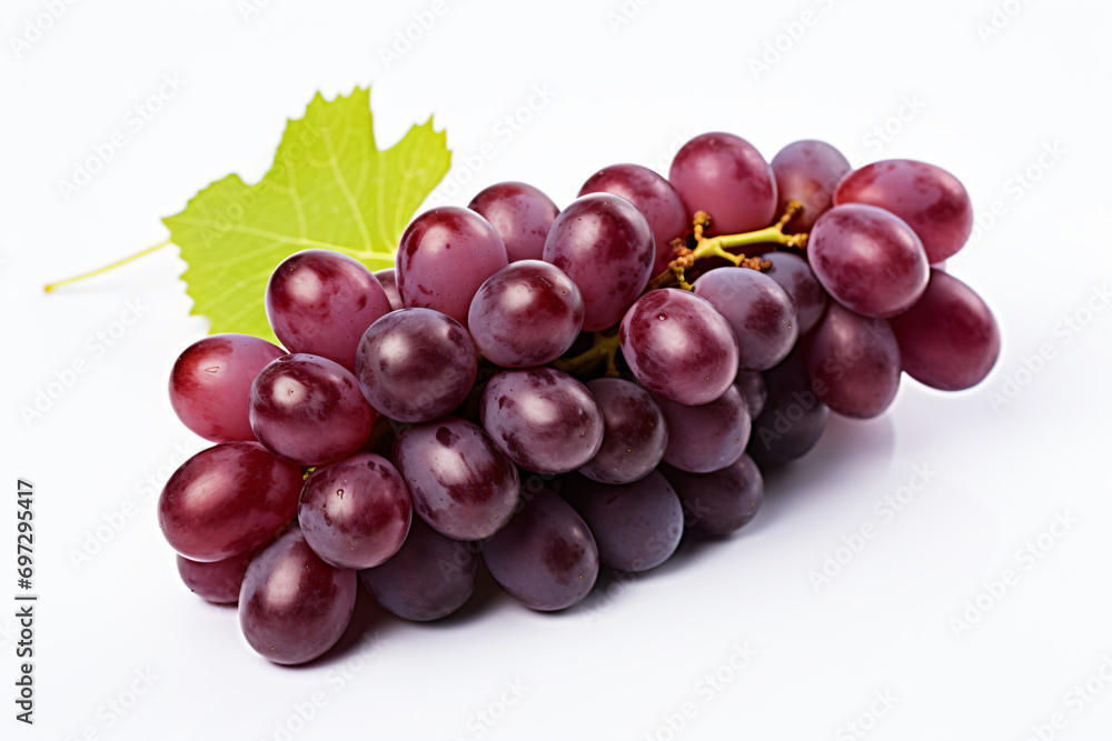 a bunch of grapes with a leaf on top