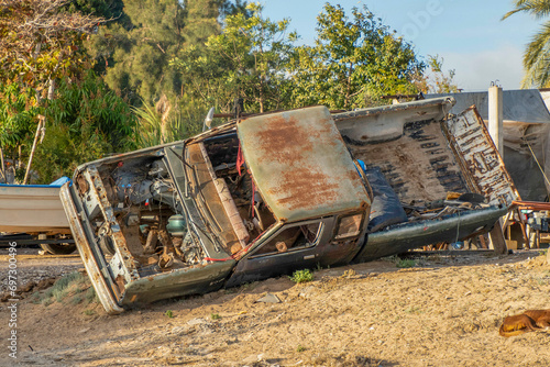 Abandoned car in adolfo lopez mateos remote village of baja california sur, Mexico photo