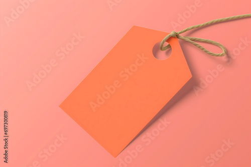 close up blank gift or sale tag on a peach fuzz background, close up 