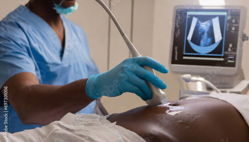 Professional ultrasound scan for patient in hospital room photo