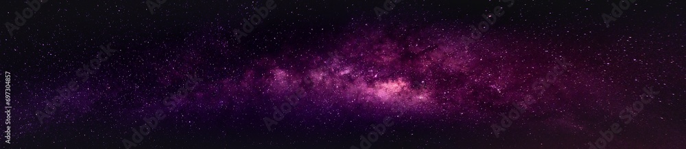 Milky way in the night sky and stars on dark background with noise and grain. Photo taken with long exposure and white balance selected. - obrazy, fototapety, plakaty 