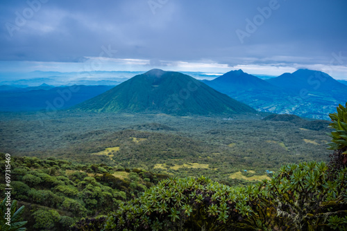 Bisoke, Sabyinyo, Gahinga, and Muhabura volcanoes viewed from Karisimbi volcano, Rwanda photo