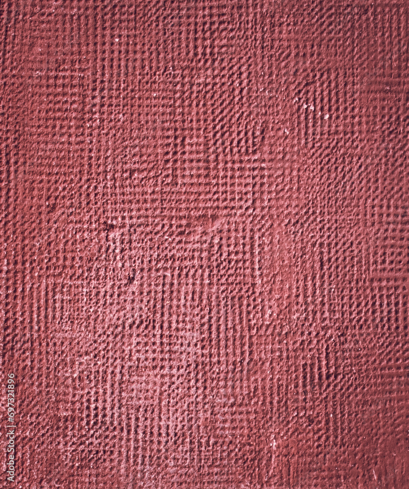 Red cement textured wall in retro concept. Old concrete background for wallpaper or graphic design.
