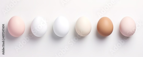 row of fresh and healthy white eggs on white background. generative AI