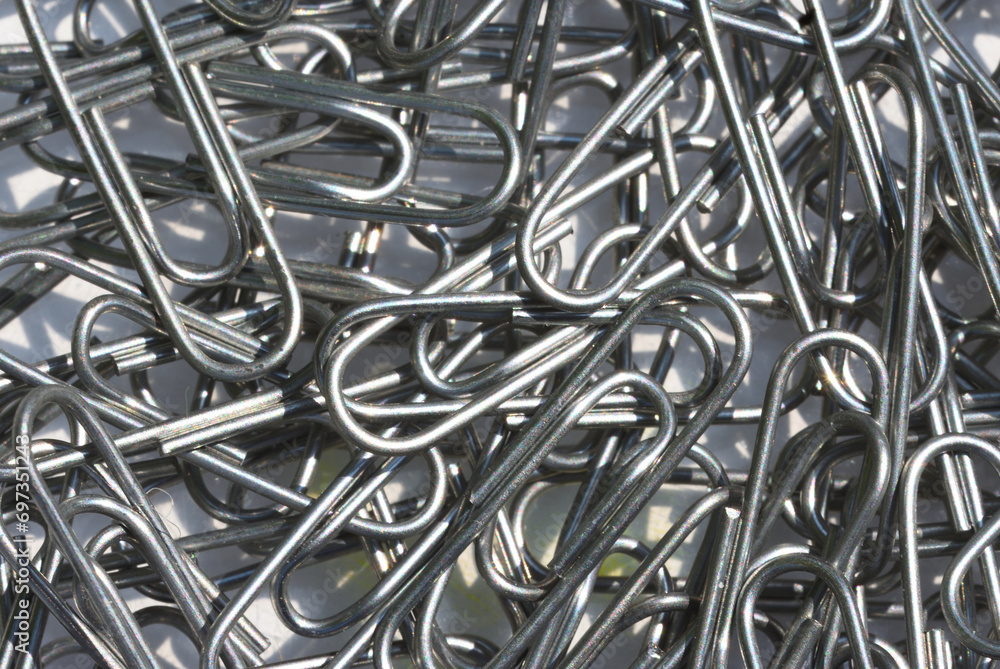Paperclips closeup background silver and white Paperclips closeup background silver and white