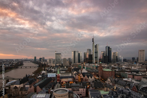 The skyline is a modern city with light in the sunset. Beautiful city photo right in the center. Financial center in Frankfurt am Main in Germany