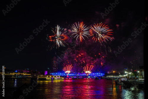 Celebrate the Chao Phraya River Festival with a light and sound show and fireworks display on the bridge in Bangkok, the capital of Thailand.