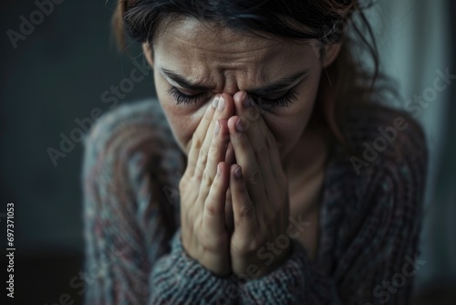 Sad depressed desperate grieving crying woman with folded hands and tears eyes during trouble, life difficulties, depression and mental emotional problems photo