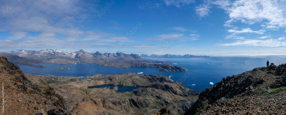 Landscape in Greenland with a view of a fjord and mountain range east greenland
