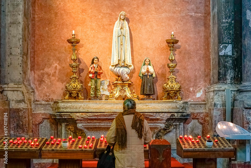 religious figures of saints of the catholic church, our lady of Fatima, santo Francisco Marto, santa Jacinta Marto, whith prayer.lisbon photo