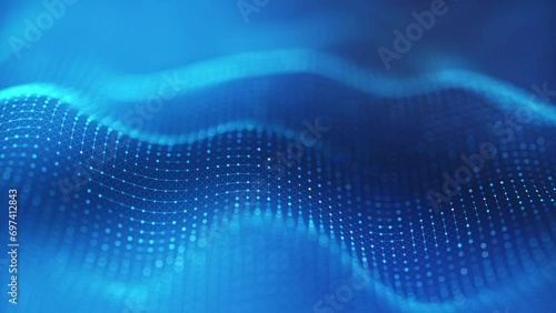 A captivating display of blue light waves that move and glow in the dark. An abstract and artistic animation of luminous patterns and shapes. photo