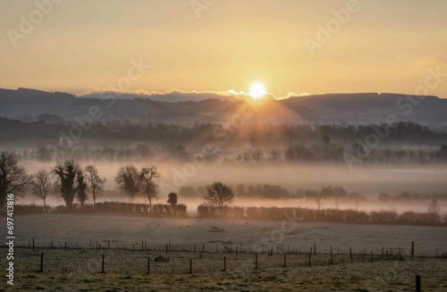 Beautiful Foggy Sunrise at Farm in Ireland