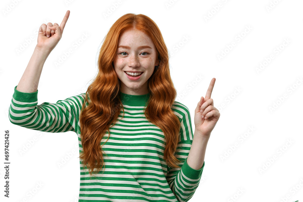 Cheerful Young girl with Red Hair Gesturing and Smiling on White Background pointing up to the empty copy space with both hands Cheerful Young girl with Red Hair Gesturing and Smiling on White Background pointing up to the empty copy space with both hands
