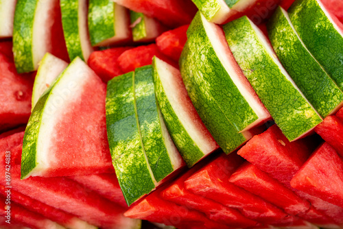Freshly sliced watermelon at a summer picnic photo
