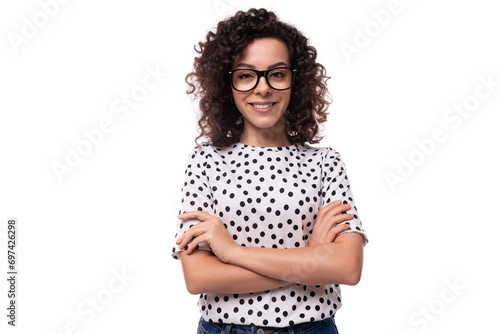 young confident leader woman with curly hairstyle dressed in summer short sleeve blouse
