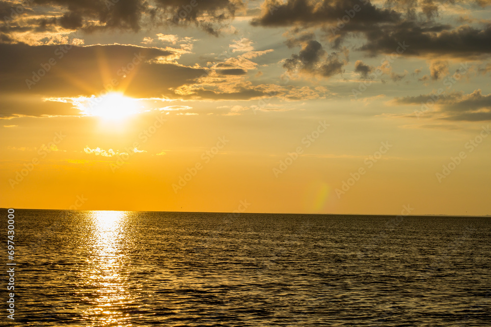 Beautiful sunset on the seashore, sunset background