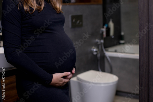 woman with big abdomen in the toilet have problems with chronic constipation, lazy bowel syndrome, and Digestive system concept