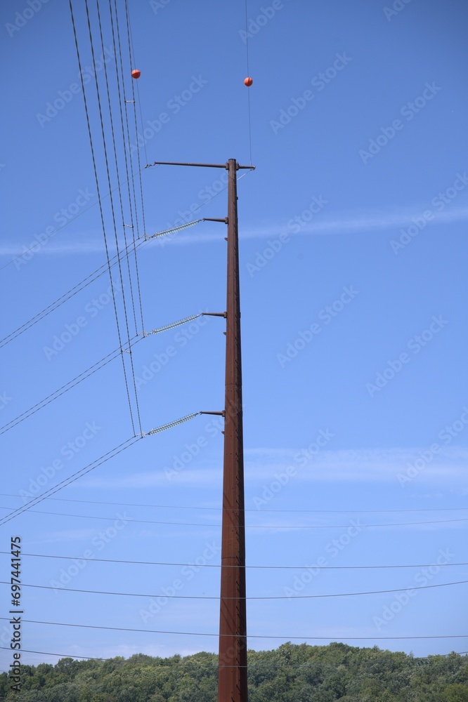 Power lines in the sky - electrical distribution and infrastructure. Power lines in the sky - electrical distribution and infrastructure.