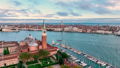 4K aerial drone view of Venice grand canal cathedral church in old town birds view. Venice italy skyline