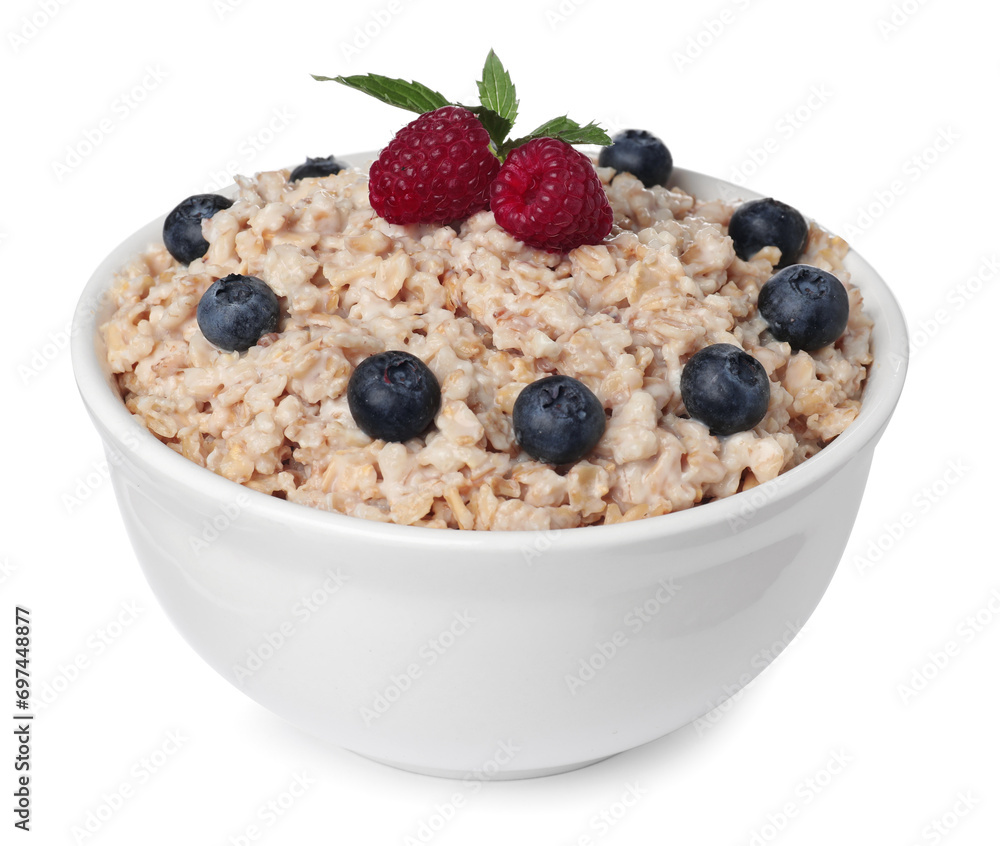 Tasty boiled oatmeal with berries in bowl isolated on white Tasty boiled oatmeal with berries in bowl isolated on white
