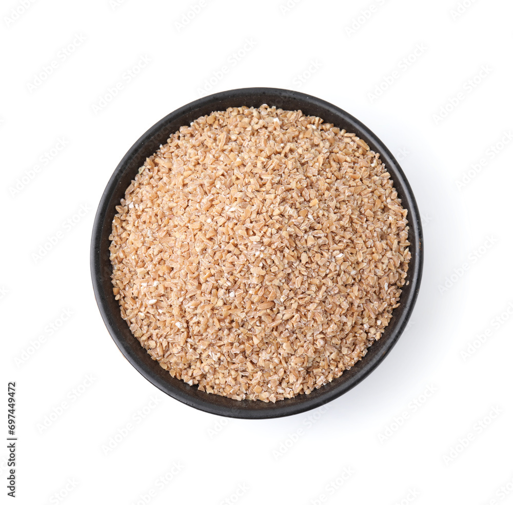 Dry wheat groats in bowl isolated on white, top view Dry wheat groats in bowl isolated on white, top view