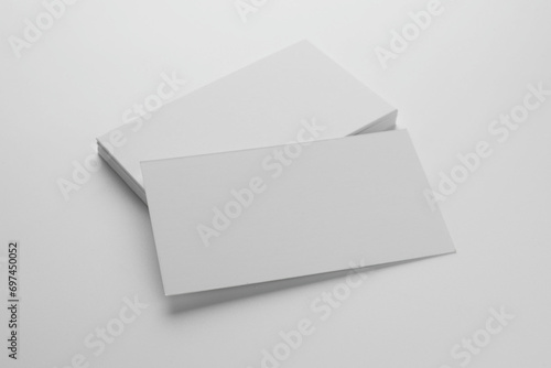 Blank business cards on white background. Mockup for design © New Africa