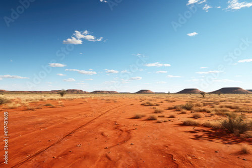A vast expanse of red earth in the Australian Outback, depicting the iconic and rugged landscape of the continent. Generative Ai.