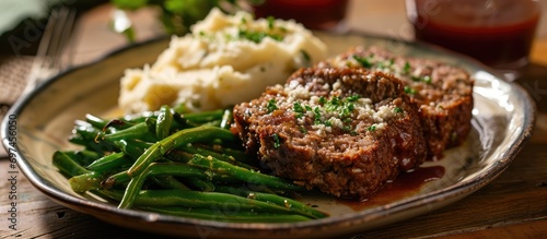 Classic plate: Meatloaf, mashed potatoes, and green beans.