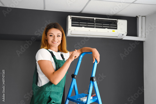 Female technician with air ...