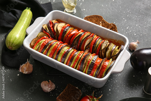 Baking dish of tasty Ratatouille on black background