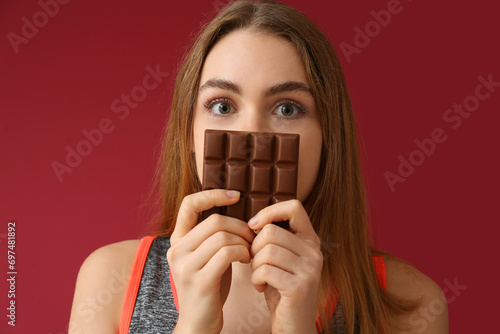 Young woman with sweet choc...