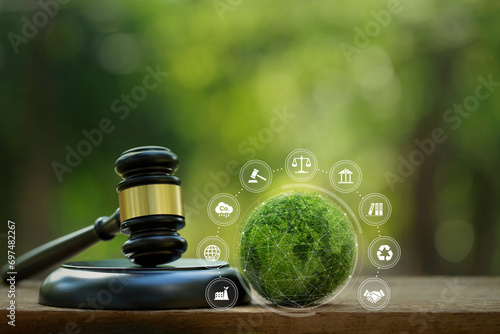 Environment Law.Carbon credit law. gavel and Green globe with Environment icons on a green background. environmental protection and eco-friendly legislation law. sustainable environmental conservation