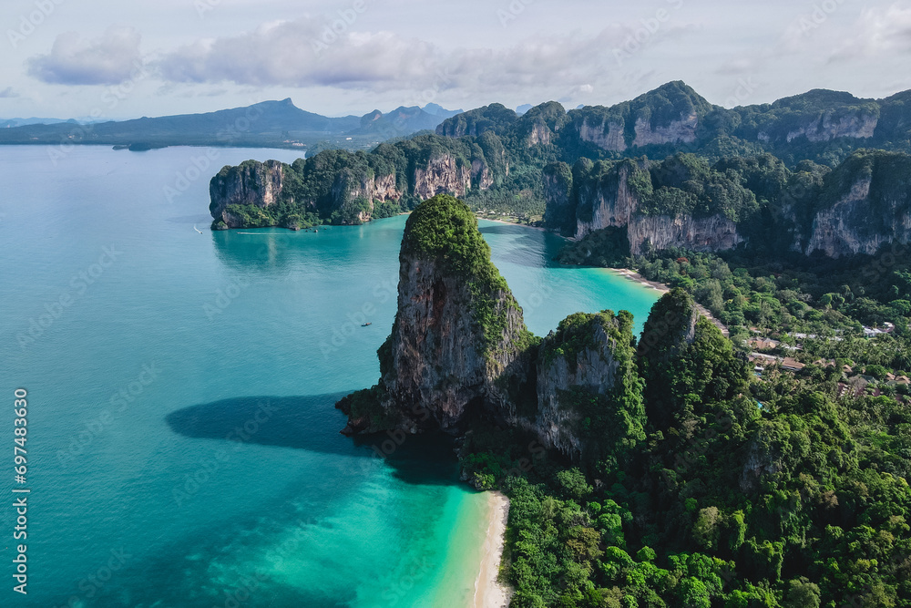 Railay Beach Krabi Thailand The tropical beach of Railay Krabi, Panoramic view from a drone of idyllic Railay Beach in Thailand in the morning with a cloudy sky and turqouse colored ocean
