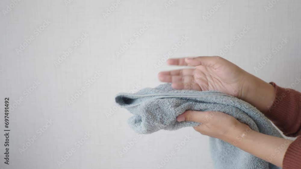 girl drying her hands in a white towel, girl drying her hands in a white towel,