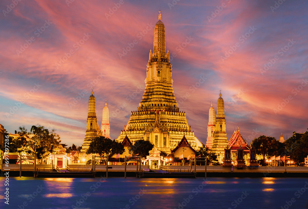 Wat Arun Temple Bangkok during sunset in Thailand. Chao praya river