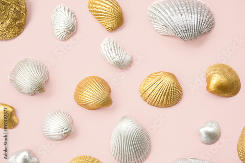 Shined cockle shells collection on pink.